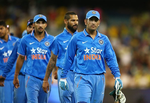 MELBOURNE, AUSTRALIA - JANUARY 17: MS Dhoni of India leads his side from the field after they lost game three of the One Day International Series between Australia and India at the Melbourne Cricket Ground on January 17, 2016 in Melbourne, Australia. (Photo by Scott Barbour/Getty Images)