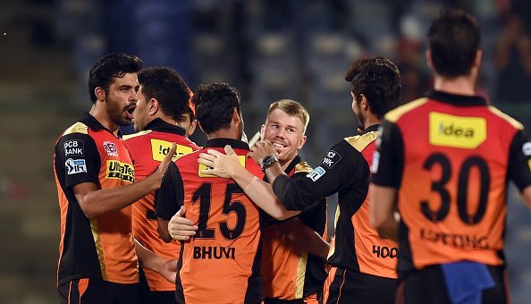 Sunrisers Hyderabad captain David Warner (C) celebrates the victory over Kolkata Knight Riders with teammates  during the 2016 Indian Premier League (IPL) Twenty20 eliminator cricket match between Kolkata Knight Riders and Sunrisers Hyderabad at the Feroz Shah Kotla Cricket Stadium in New Delhi on May 25, 2016. / AFP / PRAKASH SINGH        (Photo credit should read PRAKASH SINGH/AFP/Getty Images)